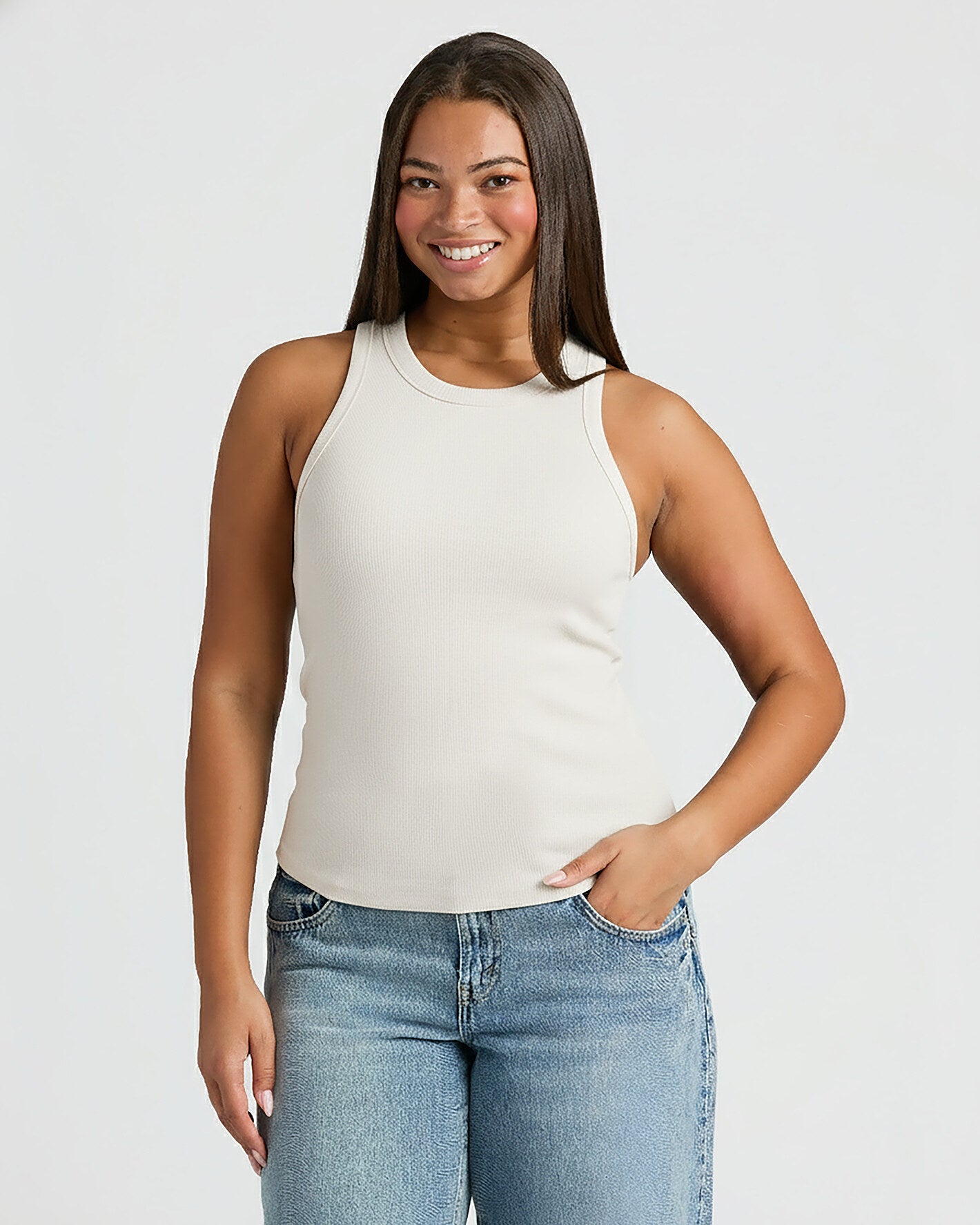 Womens Oatmeal Ribbed High Neck Tank styled with mid-wash jeans.