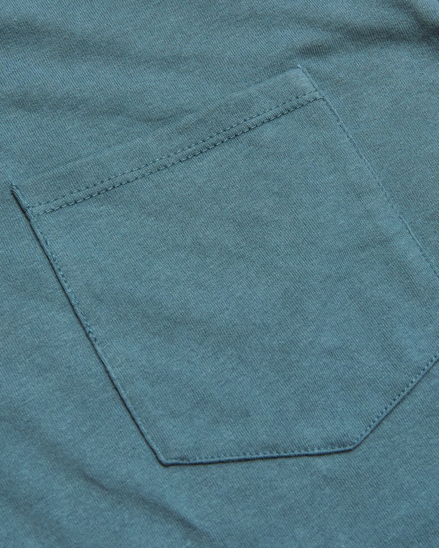 Ashblue Pocket Crew Tee with teal-blue knit fabric and patch pocket.