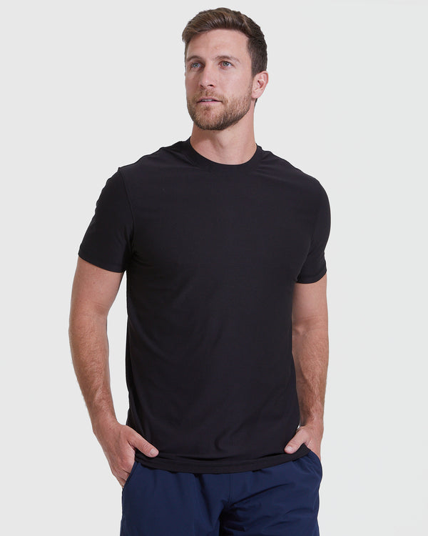 Male model in All Black Short Sleeve Tall Active Crew.