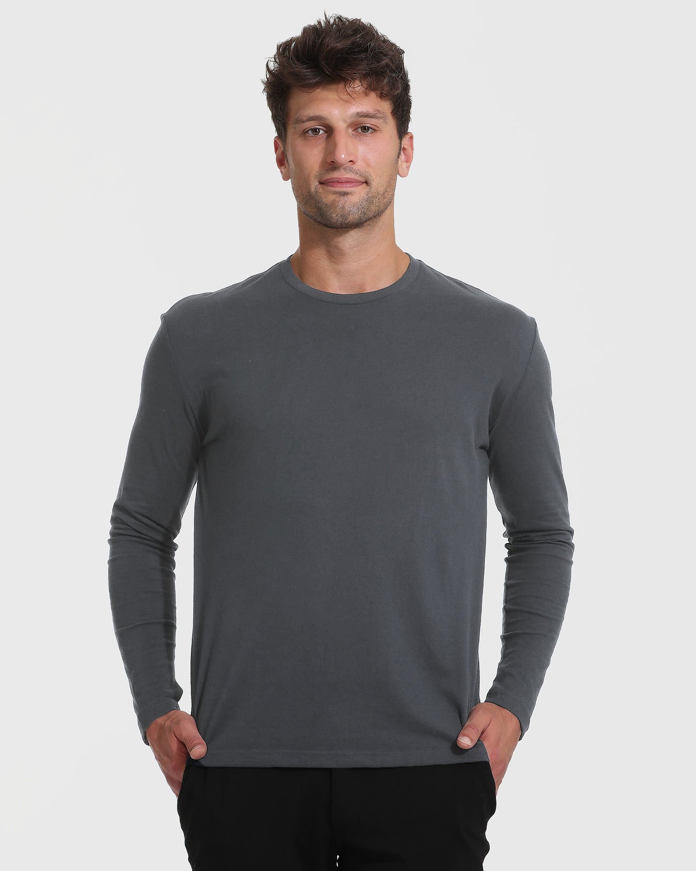 Man wearing Staple Tall Long Sleeve T-Shirt, dark gray.