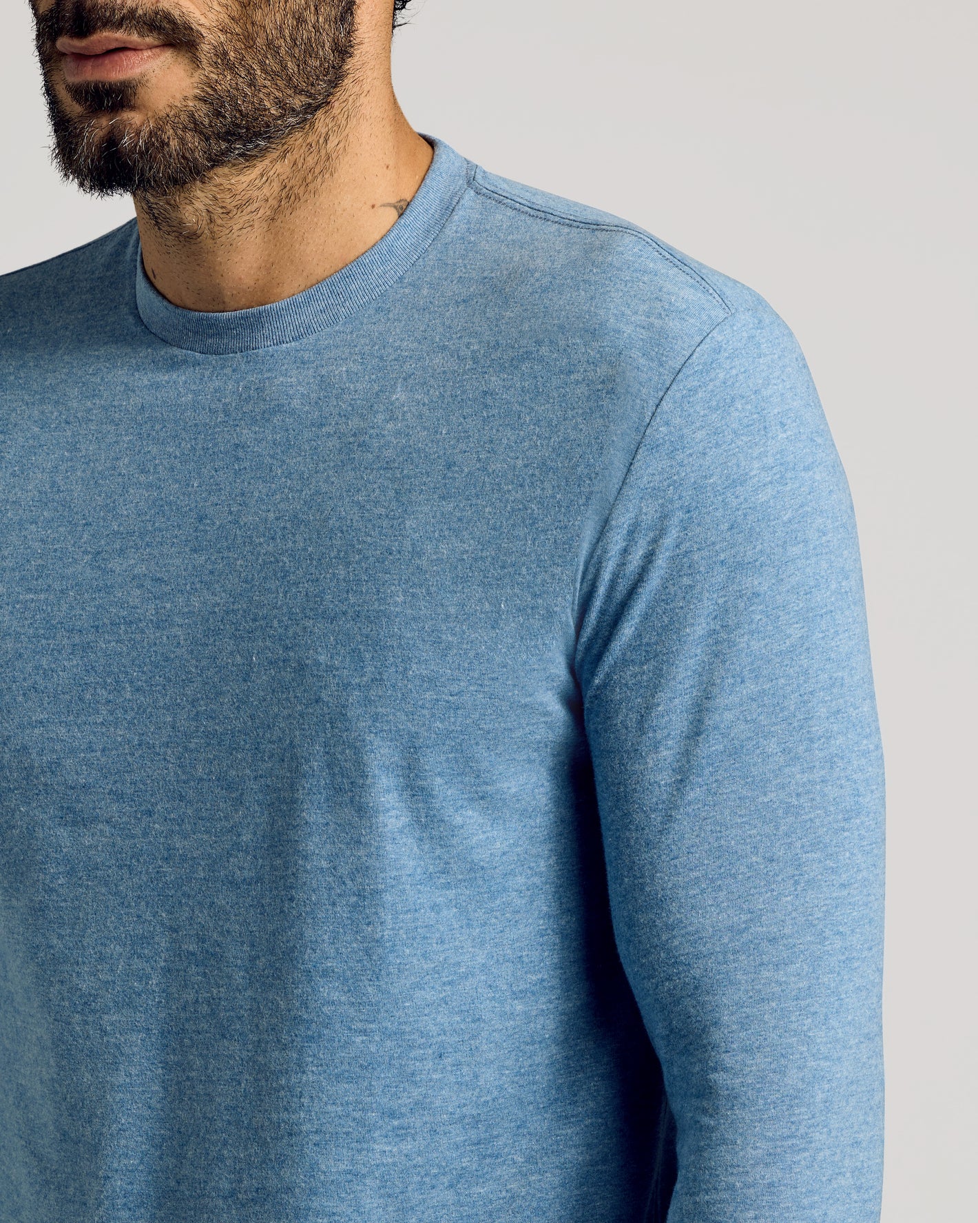 Heather Indigo Tall Long Sleeve T-Shirt on a bearded man.