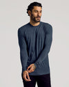 Man in Staple Tall Long Sleeve T-Shirt, showcasing fit and tattoo.