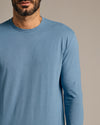 Man wearing Indigo Tall Long Sleeve T-Shirt, showcasing its perfect fit.