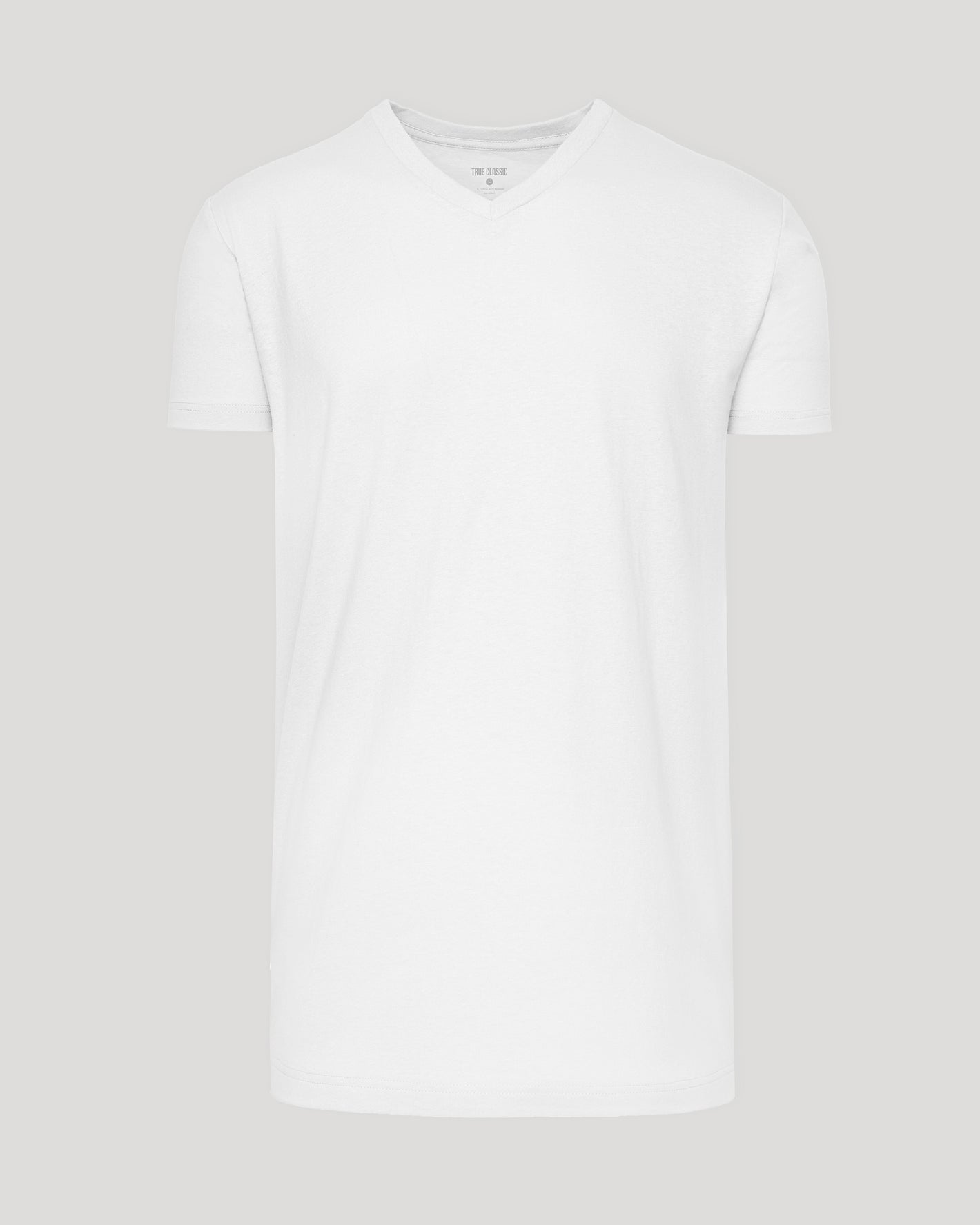 White Tall Short Sleeve Classic V-Neck laid flat, showcasing its tailored design.