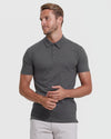 Model in The Staple Tall Classic Polo 3-Pack, dark-gray, fitted style.