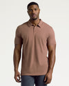 Young man modeling Dark Heather Sepia Short Sleeve Tall Polo.