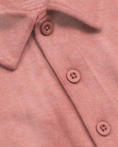 True ClassicHeather Cayenne Short Sleeve Tall Polo close-up, showcasing knit fabric, collar, buttons.