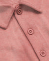 Heather Cayenne Short Sleeve Tall Polo close-up, showcasing knit fabric, collar, buttons.
