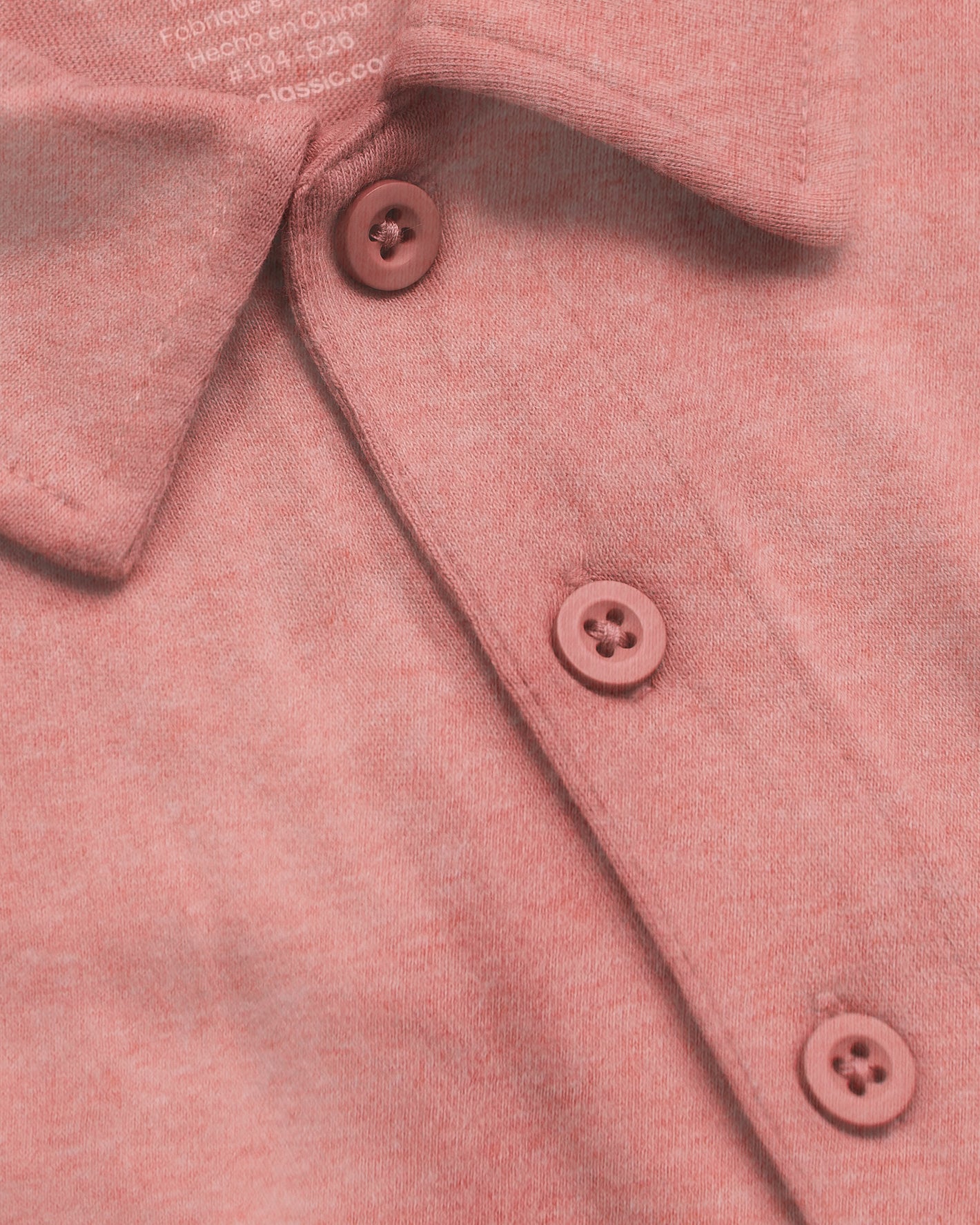 Heather Cayenne Short Sleeve Tall Polo close-up, showcasing knit fabric, collar, buttons.