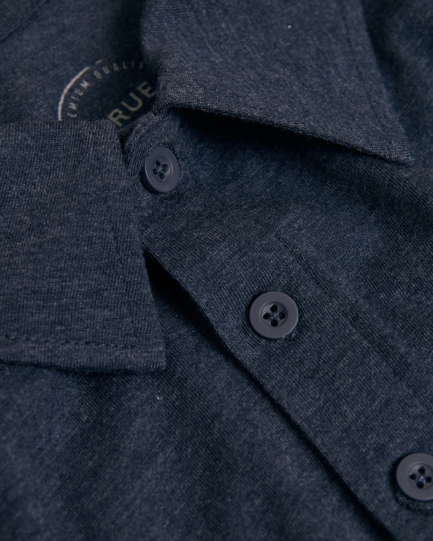 Heather Navy Short Sleeve Tall Polo close-up showing collar and buttons.