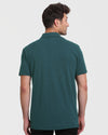 Man in Heather Seafarer Short Sleeve Tall Polo, side profile view.