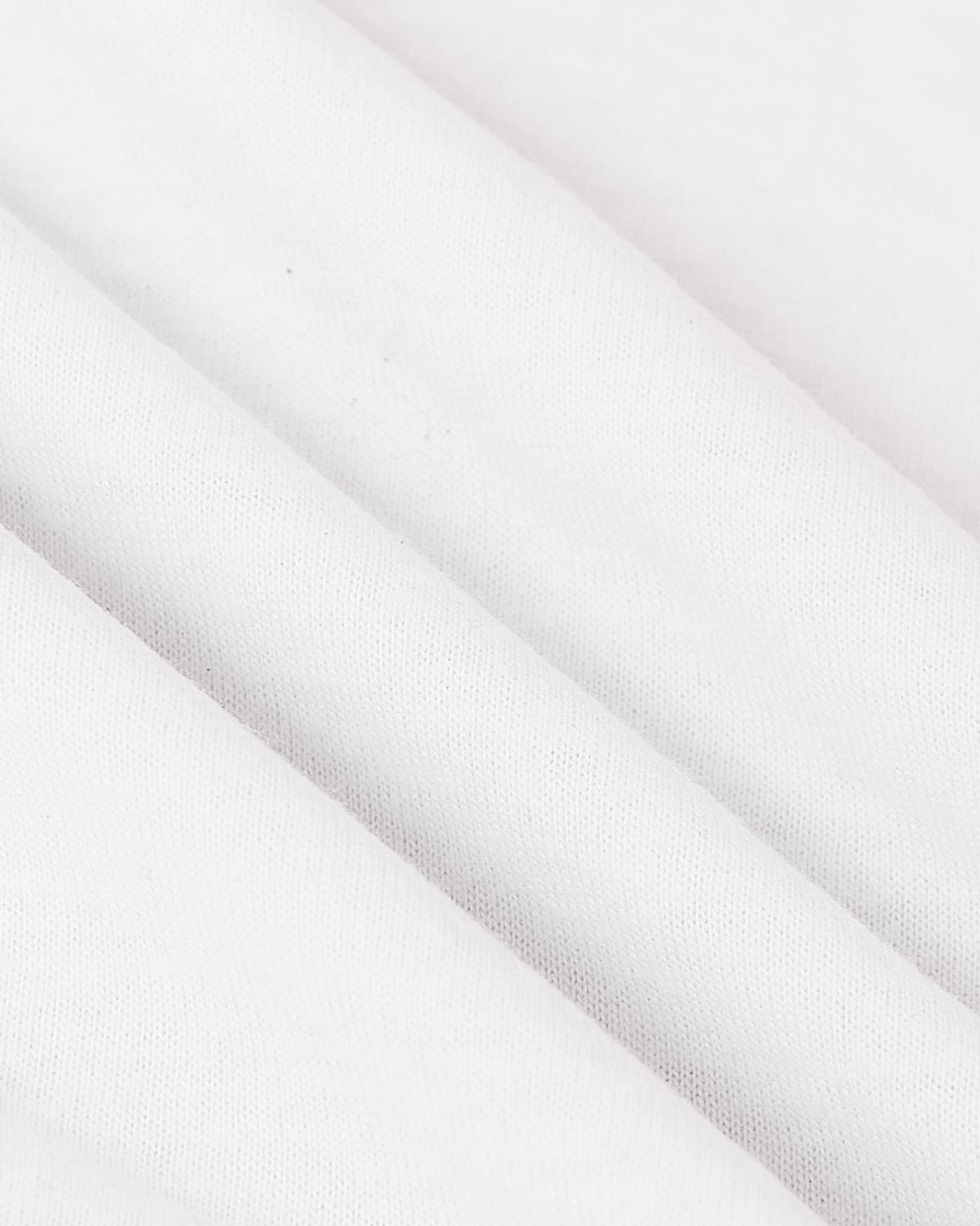 White woven fabric, showcasing texture and softness of Black & White Tall Classic Polo.