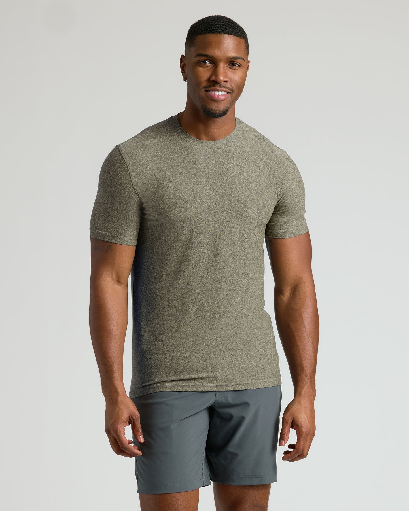 Man wearing Heather Military Green Tall Active Crew Neck 2.0.
