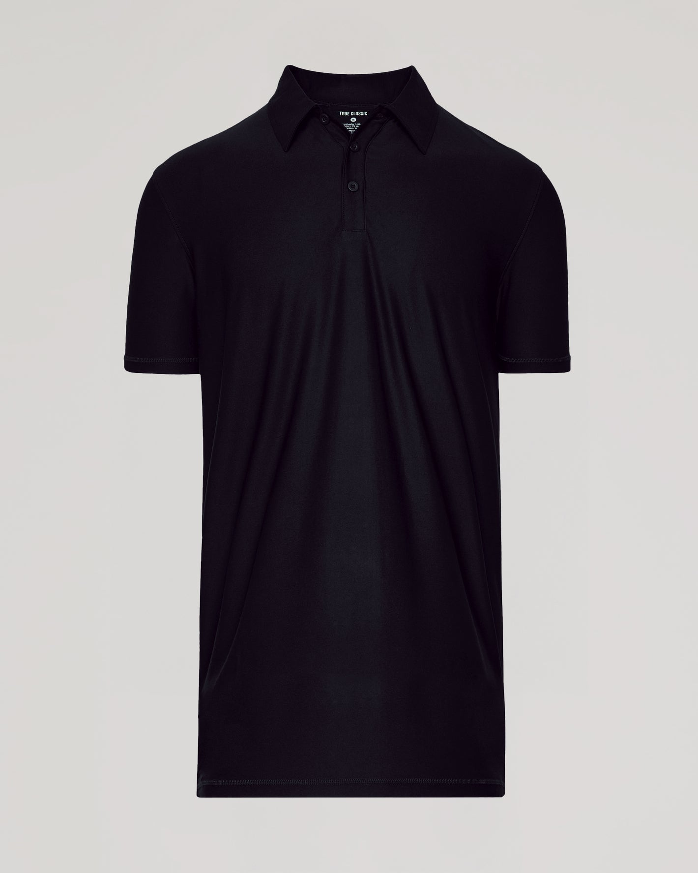 Black Short Sleeve Tall Active Polo on light background, showcasing collar and placket.