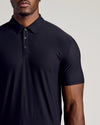 Black Short Sleeve Tall Active Polo with three-button placket, worn by a model.