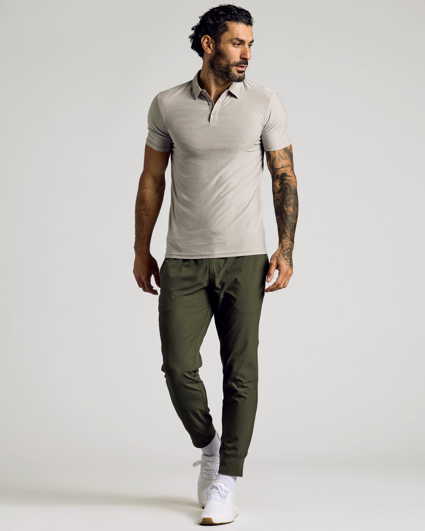 Man wearing Light Heather Gray Short Sleeve Tall Active Polo.
