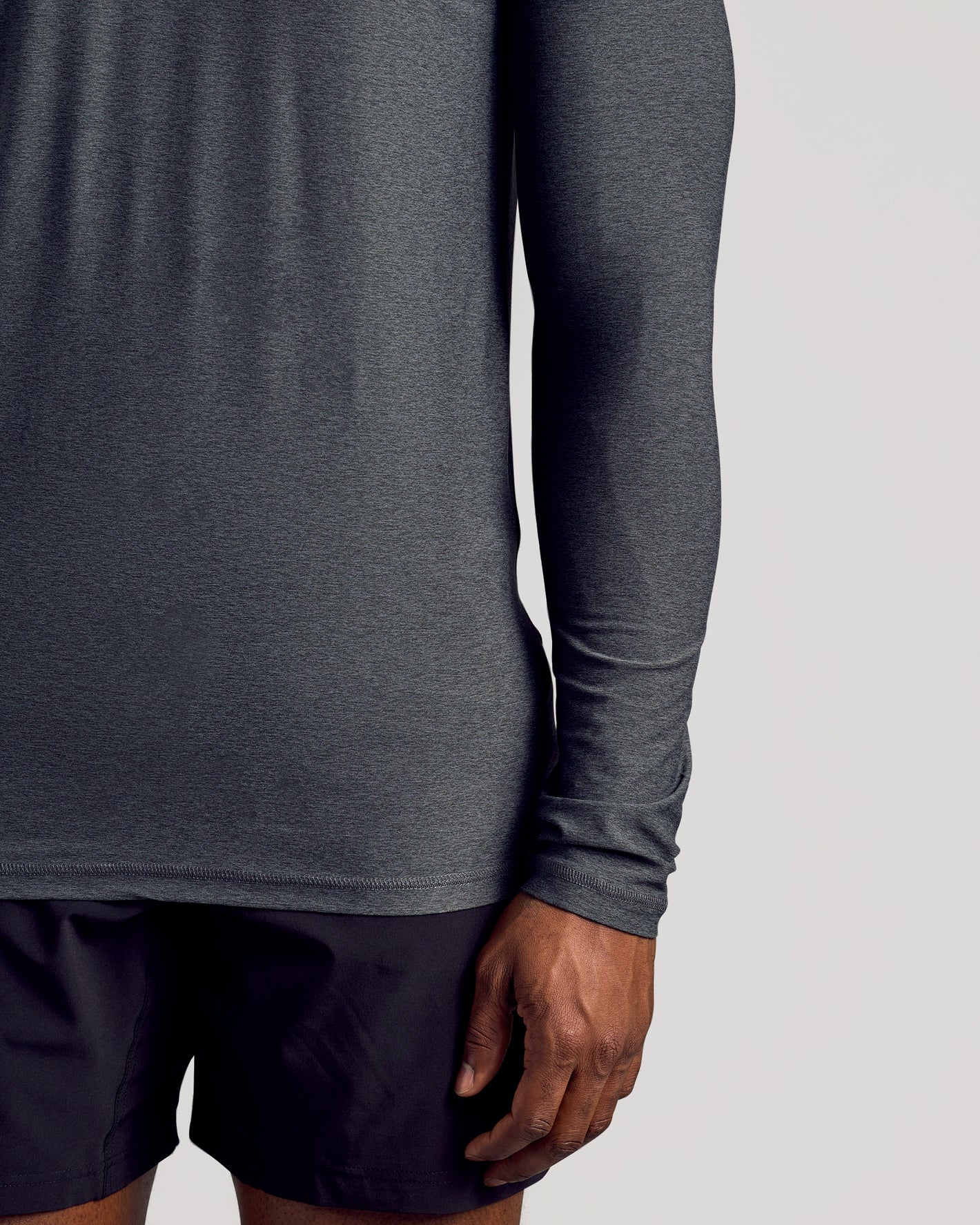 Charcoal Heather Gray Long Sleeve Tall Active Crew on athlete in motion.