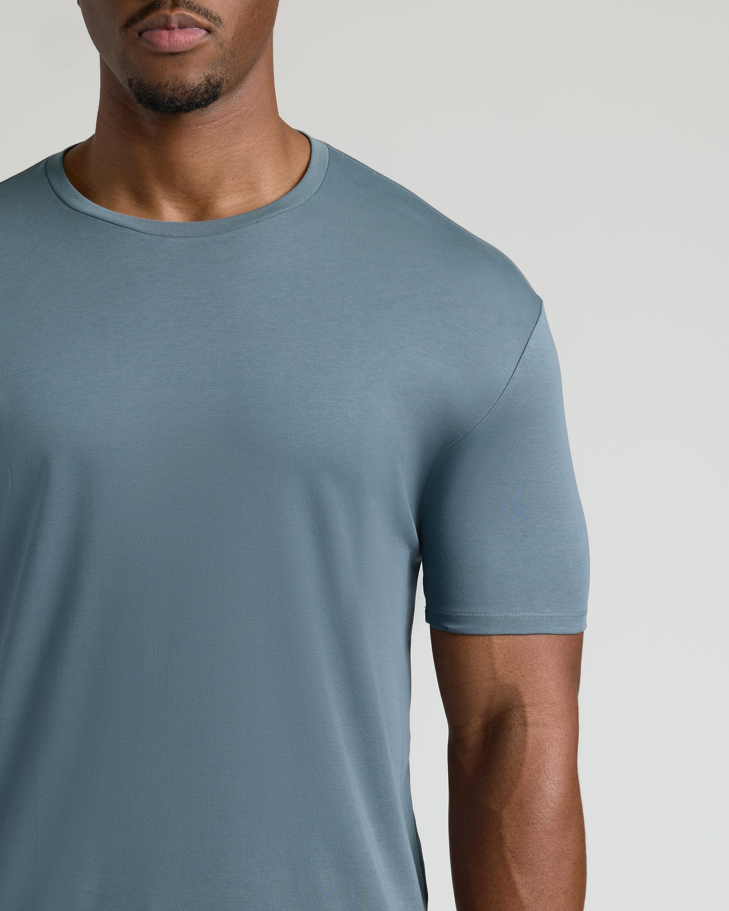 Tempest Tall Premium Pima Crew Neck on model, showcasing snug fit.