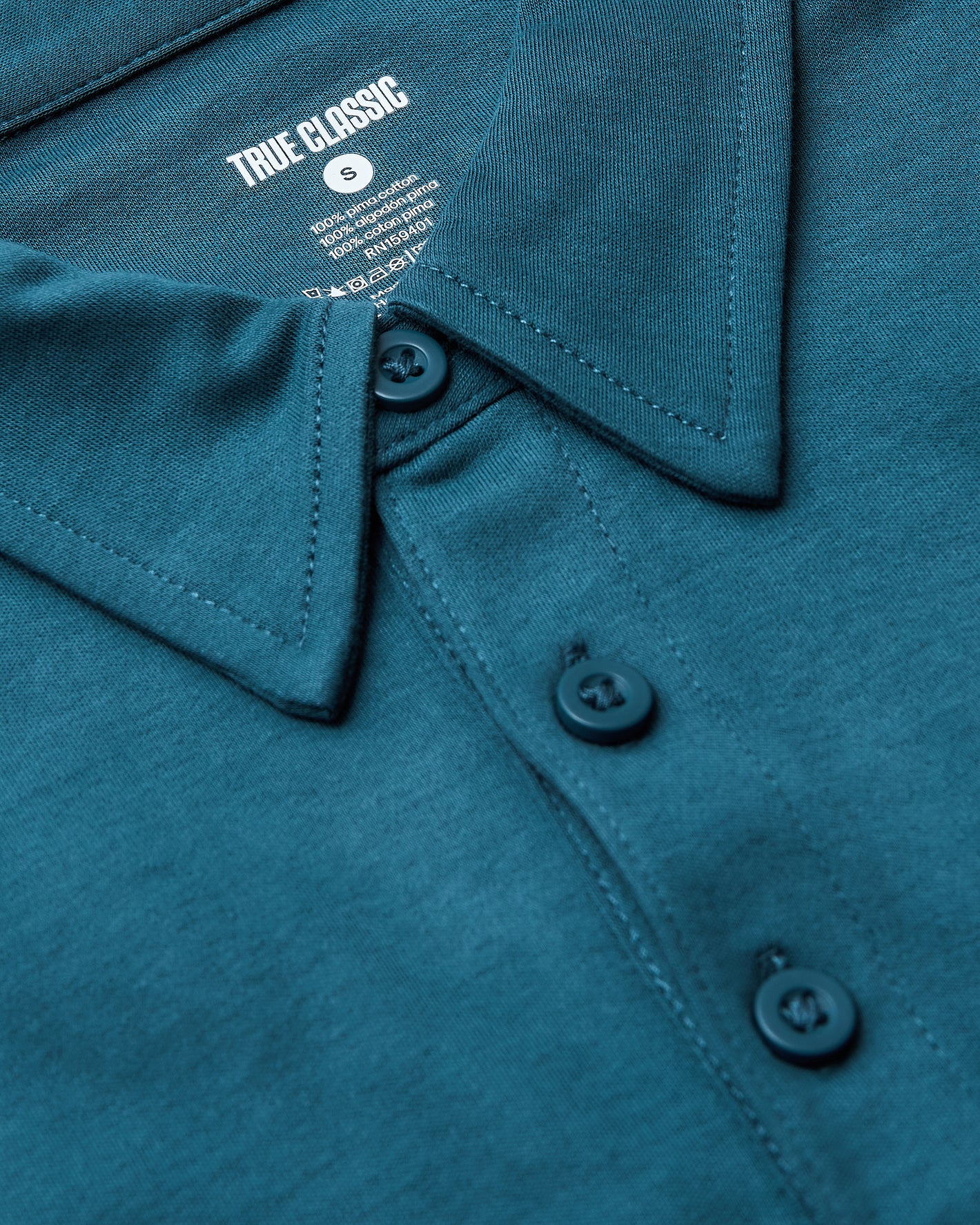 Lagoon Tall Pima Polo with pointed collar, three-button placket, “TRUE CLASSIC” label.