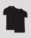 Two black polo shirts on a light gray background