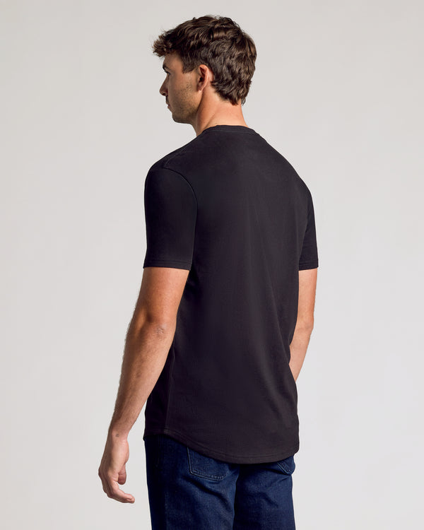Person in All Black Short Sleeve Tall Curved Hem Crew T-shirt.