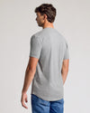 Heather Gray Short Sleeve Tall Curved Hem Crew on man, back view.