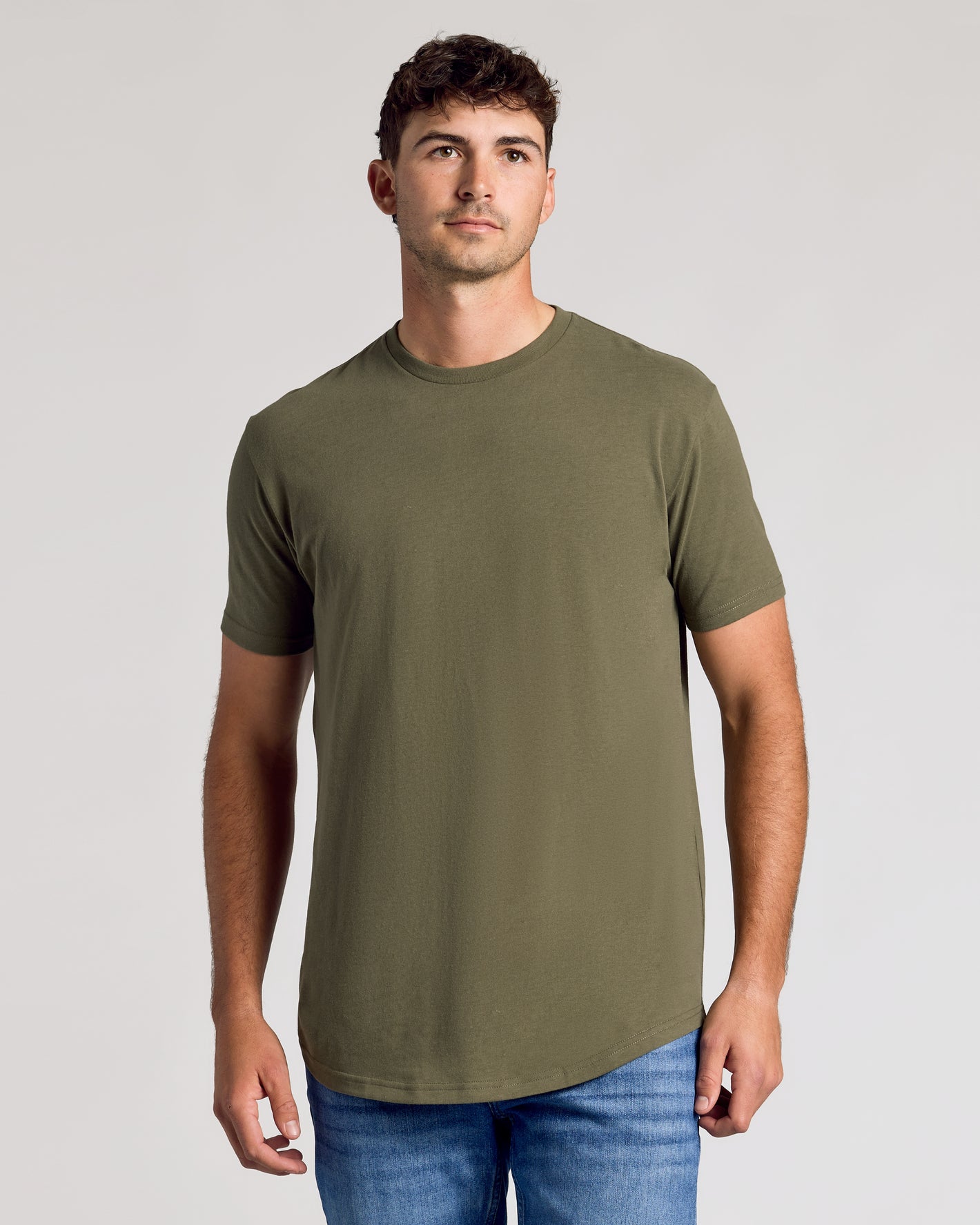 Young man wearing Short Sleeve Tall Curved Hem Crew.