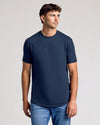 Young man wearing Short Sleeve Tall Curved Hem Crew.