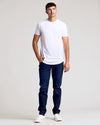 Young man in White Classic Tall Curved Hem Crew 10-Pack.