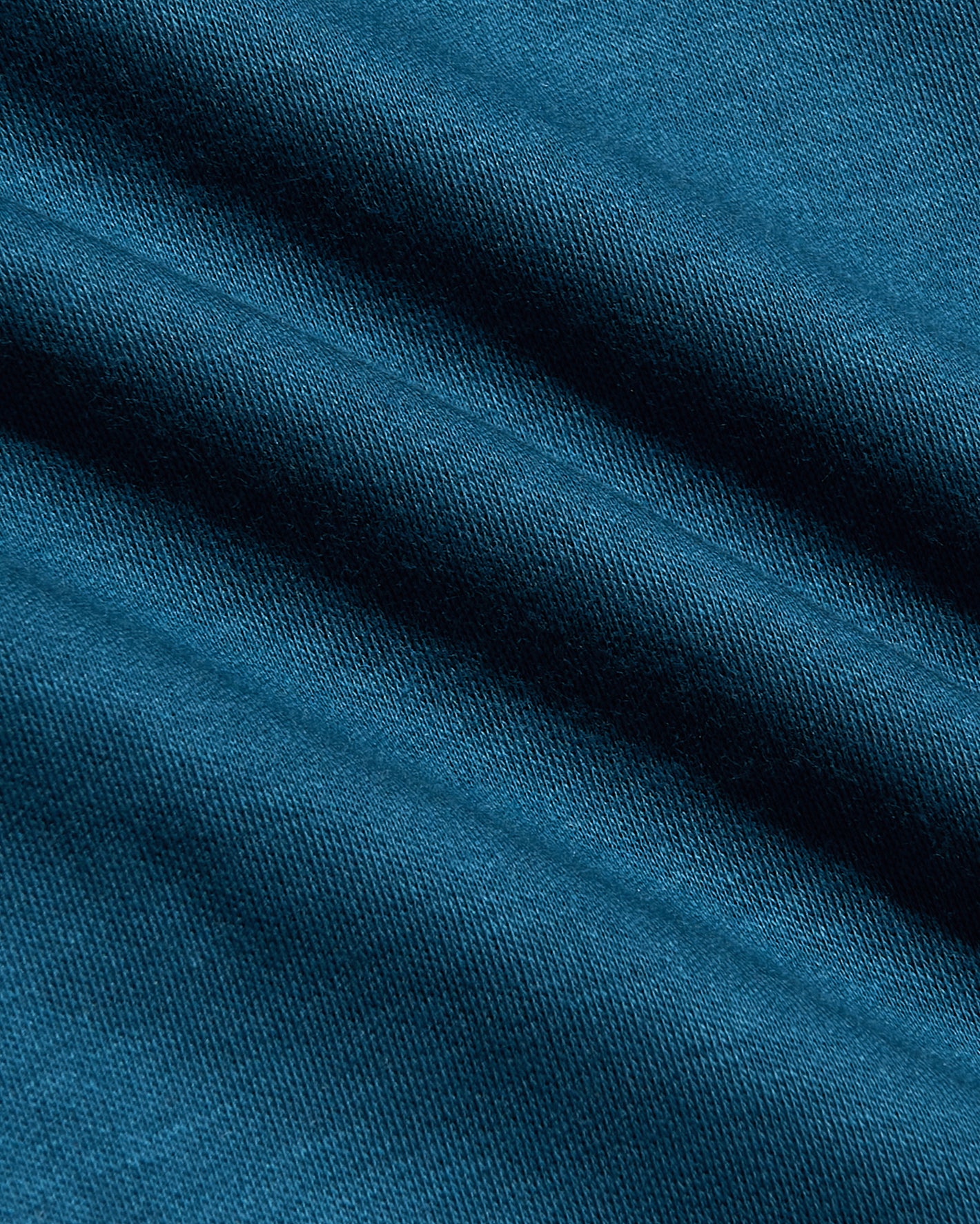 Close-up of Navy & Lagoon Tall Premium Pima Crew Curved Hem fabric.