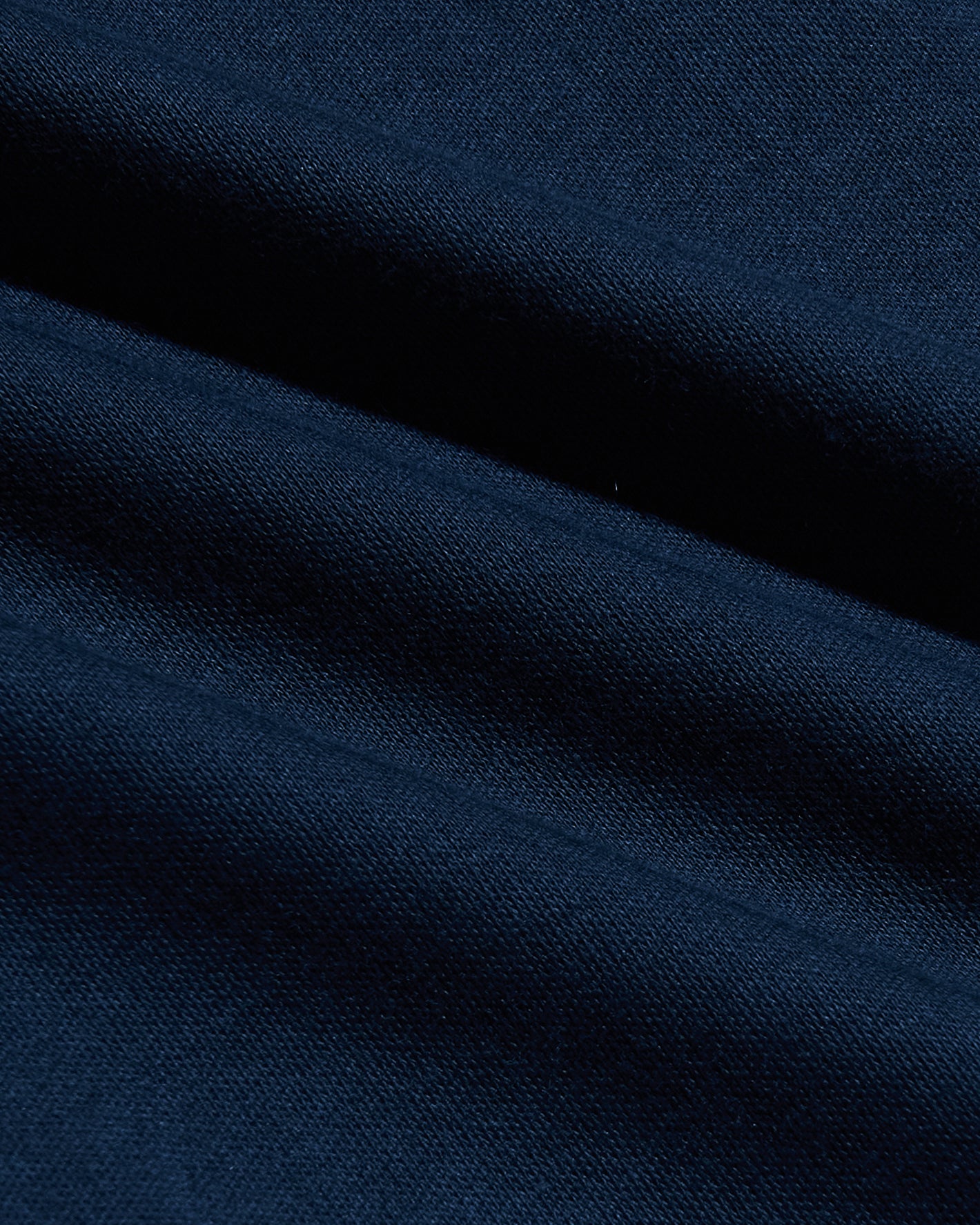 Navy Tall Premium Pima Crew Curved Hem in silky, textured knit fabric.