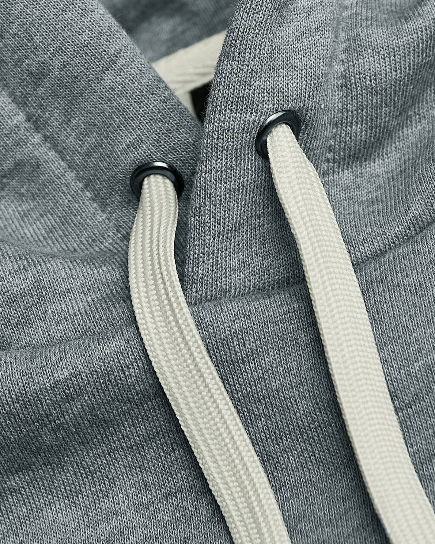 Medium Heather Gray Tall Fleece Pullover Hoodie close-up: knit fabric, eyelets, drawstrings.