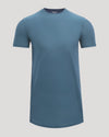 A short-sleeve crewneck t-shirt in a muted slate blue color, displayed on a neutral light gray background.