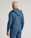Back view of Fiord Fleece French Terry Zip Hoodie worn by model.
