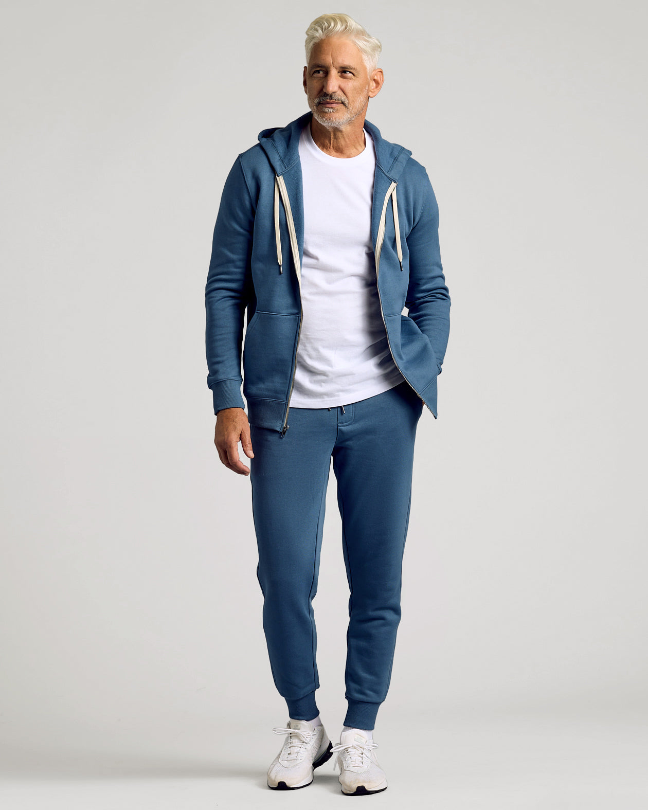 Fiord Fleece French Terry Zip Hoodie worn by man in relaxed pose.