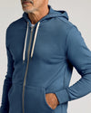 Fiord Fleece French Terry Zip Hoodie on man with hand in pocket.