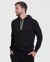 Model in profile wearing The King Of 24/7 Comfort 4-Pack hoodie.