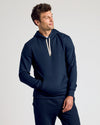 Navy Pullover Fleece Hoodie & Jogger 2-Pack worn by a man.