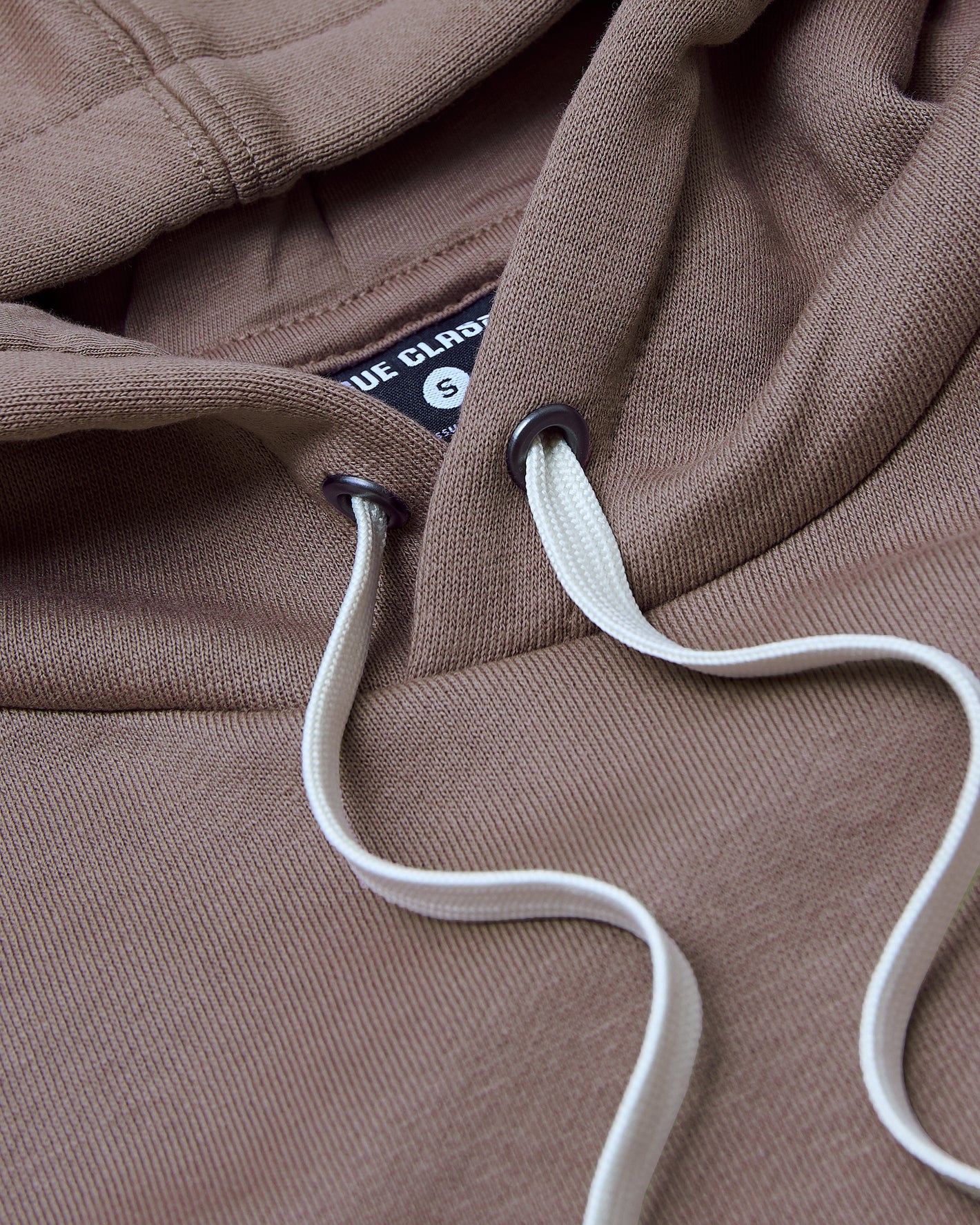 Slate Mauve Fleece French Terry Pullover Hoodie close-up with textured fabric.