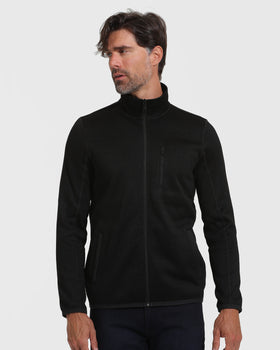 Black Sweater Fleece Jacket on model with chest pocket and stand-up collar.