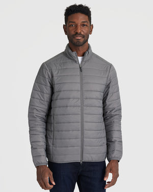 Man wearing Gunmetal Puffer Jacket, highlighting its slim-quilted design.