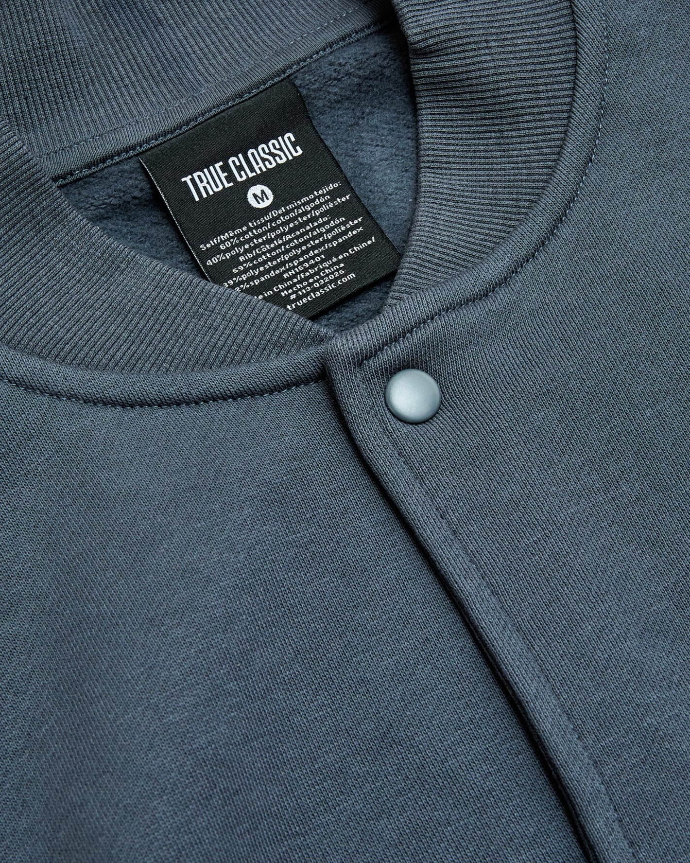 Neptune Fleece Bomber Jacket with ribbed collar and snap-front placket.