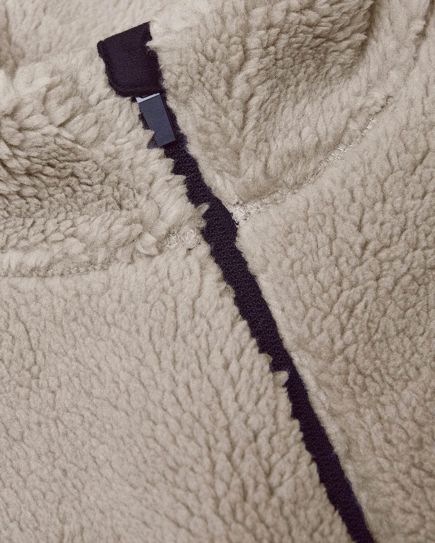 Taupe Sherpa Full Zip Jacket, close-up of fleece fabric and buckle.