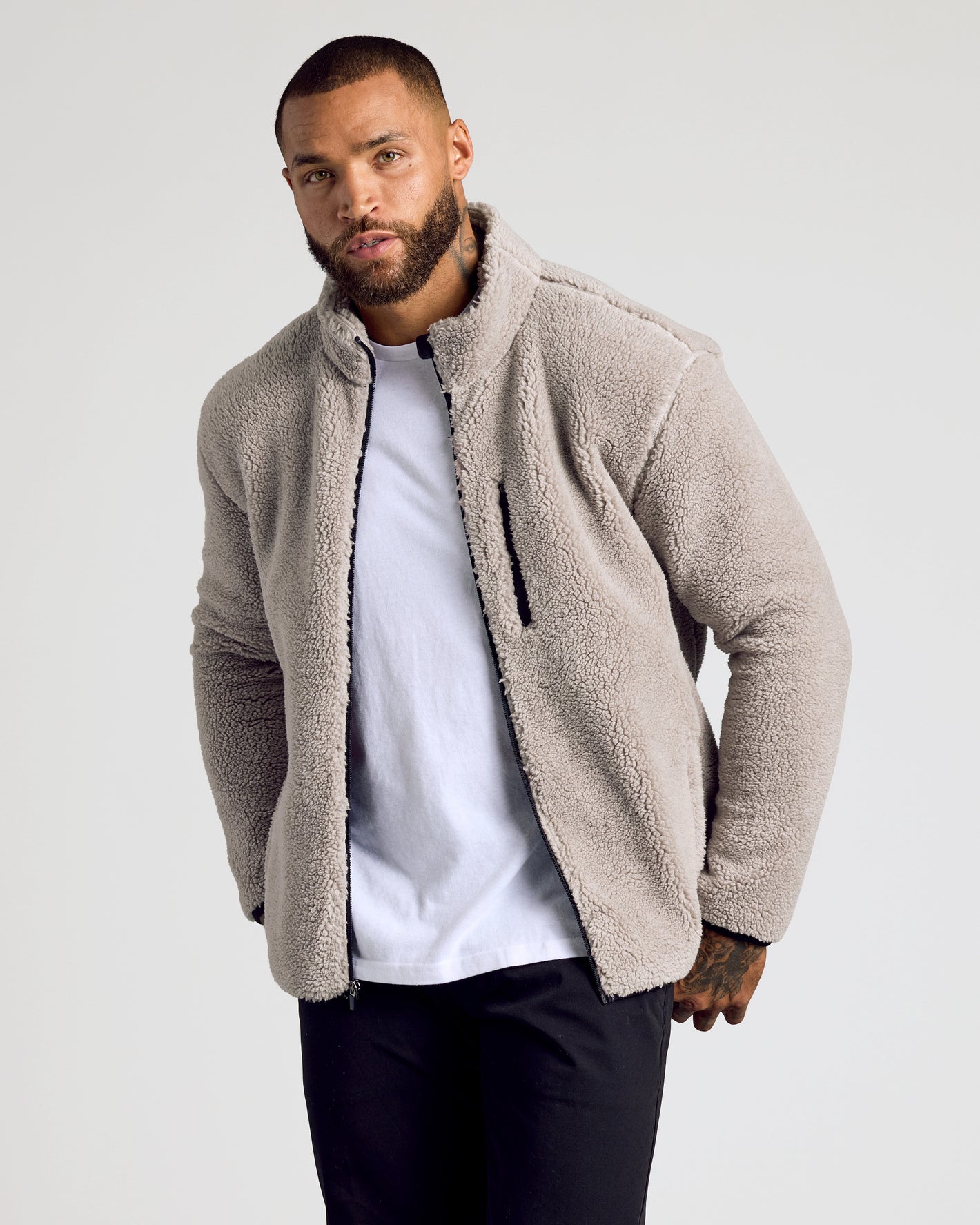 Taupe Sherpa Full Zip Jacket worn by man against gray background.