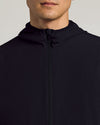 Black Active Shell Jacket with full zipper and hood, showcasing slim fit.