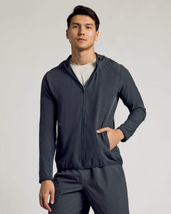 True ClassicYoung man modeling Charcoal Heather Gray Active Shell Jacket with hood.