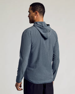 True ClassicHeather Navy Active Shell Jacket worn by man, side view.
