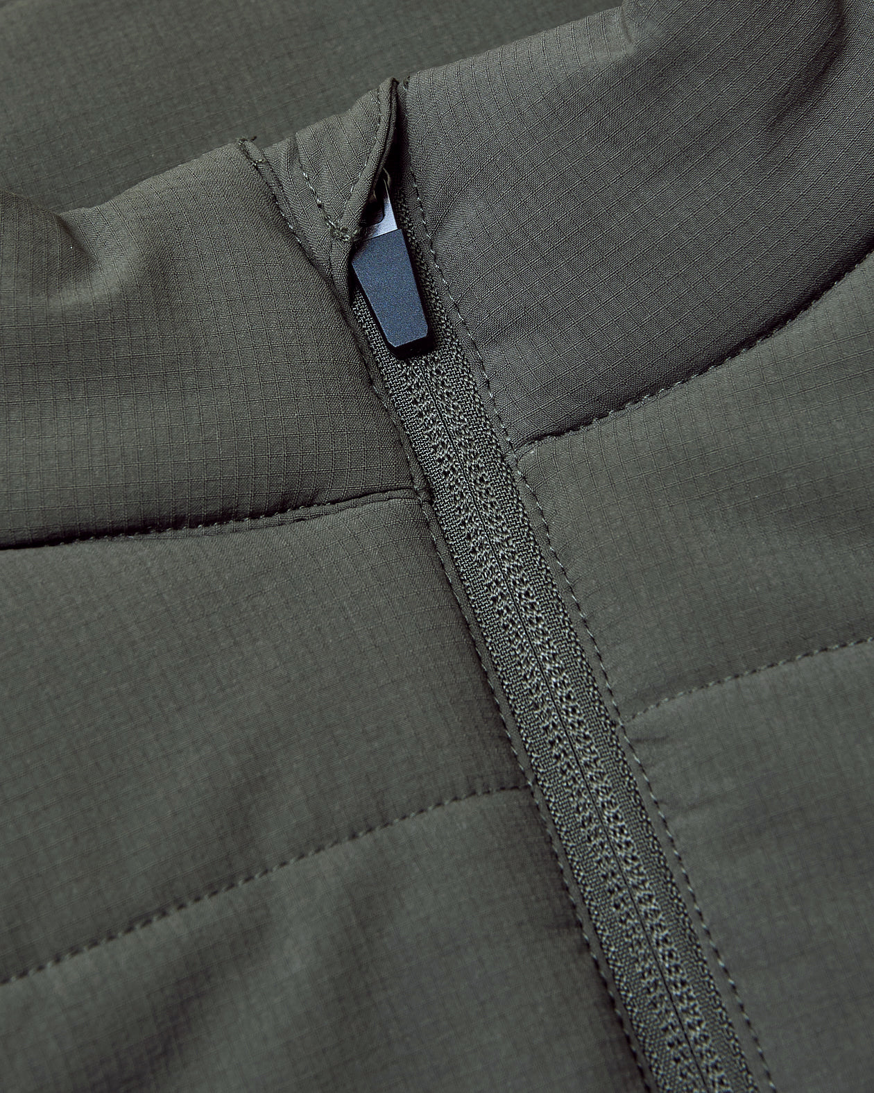 Carbon Puffer Vest with quilted stitching and central zipper.