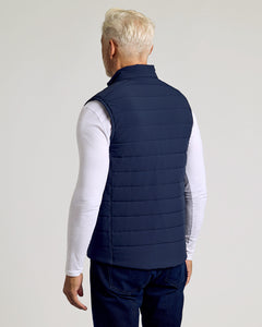 True ClassicMan wearing Navy Puffer Vest over long-sleeve T-shirt and jeans.