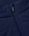 Navy Puffer Vest fabric with quilted panels and zipper.